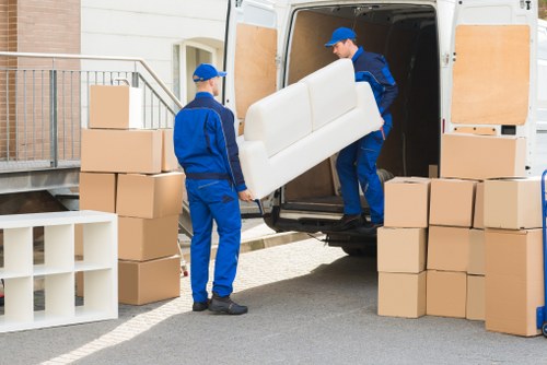 Mover using correct lifting technique with packed boxes