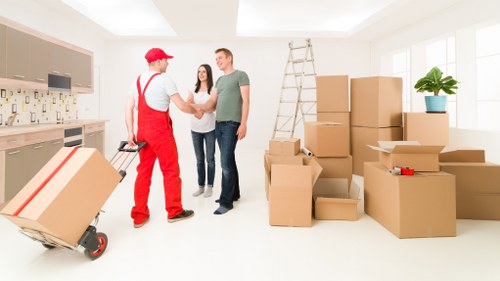 Removals vehicle and moving crew working in West London