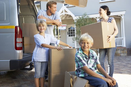Furniture being loaded into a removal van in Ealing