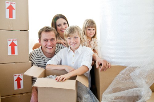 Loading household items into a van in Ealing