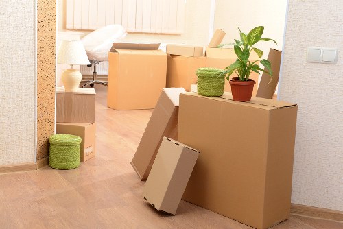 Local movers packing office equipment for a business relocation in Ealing