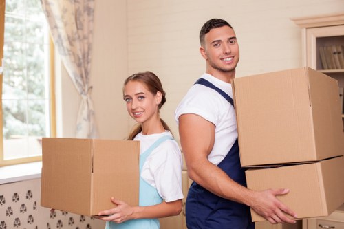 Professional movers handling a flat removal in West London