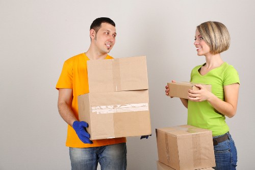 Packed household boxes ready for collection during a local move