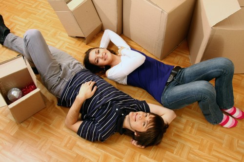 A professional office move team handling commercial equipment in West London