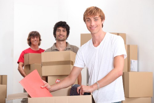 Local moving team navigating a residential street in Ealing