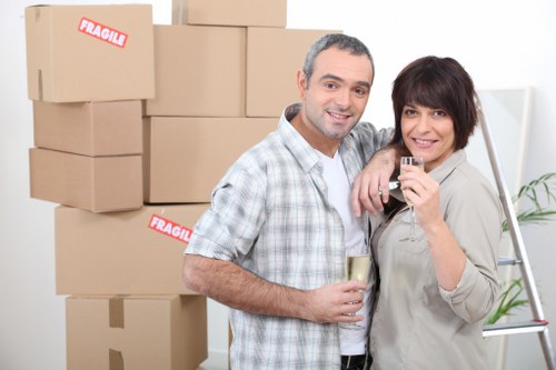 Unpacking service helping a family settle into a new Ealing home